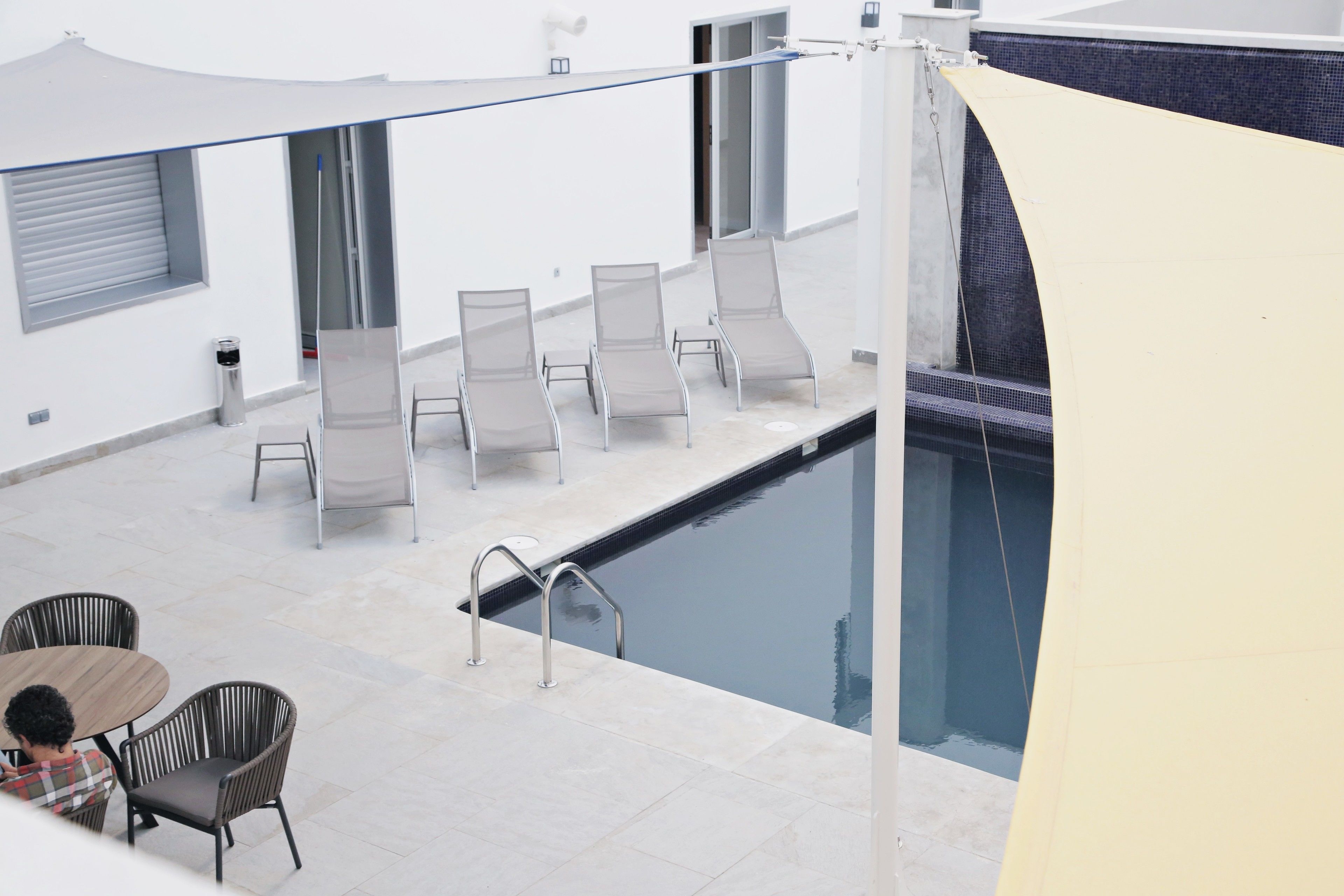 outdoor pool, pool loungers