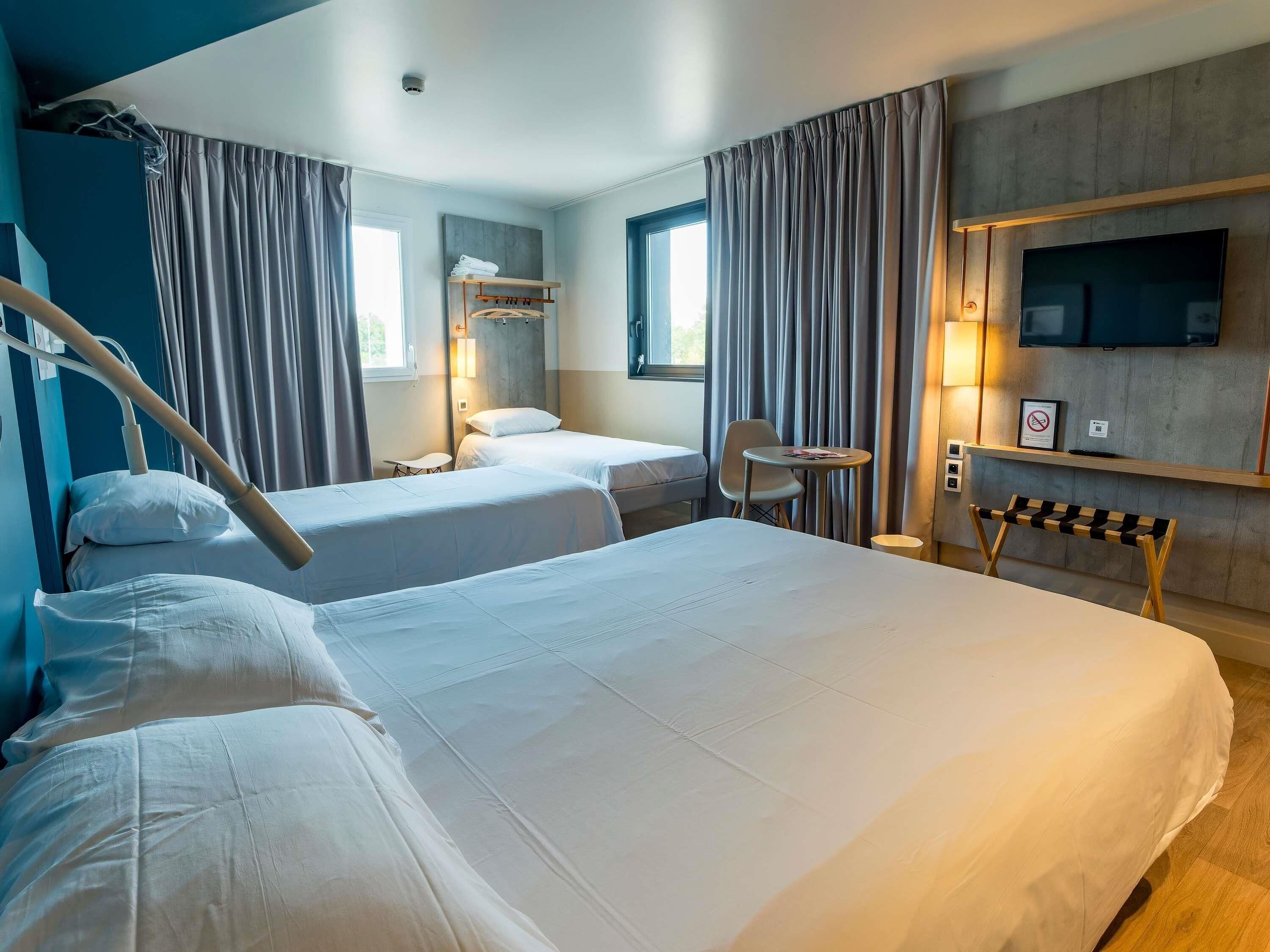 family room | desk, blackout curtains, soundproofing, cots/infant beds