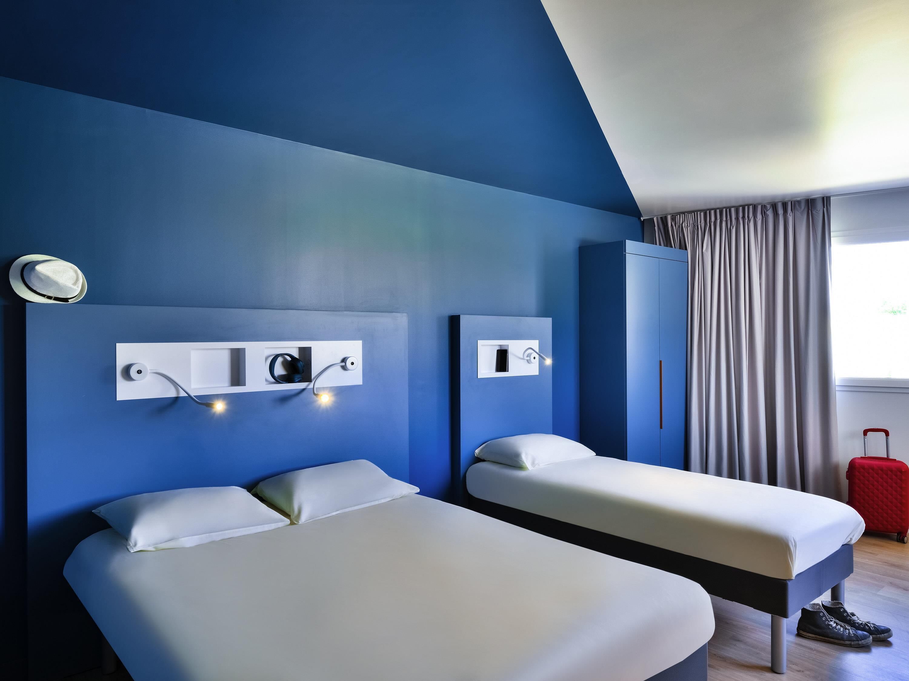 family room | desk, blackout curtains, soundproofing, cots/infant beds