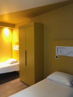 Desk, blackout curtains, soundproofing, cots/infant beds
