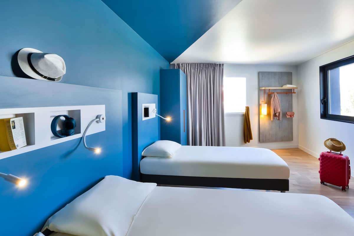 family room | desk, blackout curtains, soundproofing, cots/infant beds