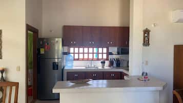 Family House, 2 Bedrooms | Private kitchen | Full-size fridge, microwave, stovetop, coffee/tea maker
