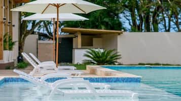 Outdoor pool, pool umbrellas, pool loungers