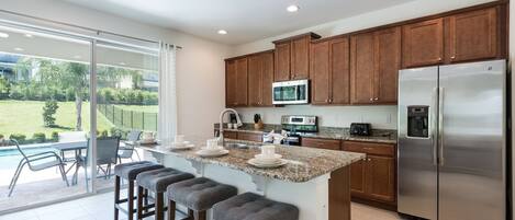 Suite Premium, varias camas, no fumadores | Cocina privada | Frigorífico, microondas, horno y placa de cocina