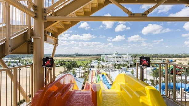 A water park with multiple slides and a view of the surrounding area. - New House, Near Disney, Private Pool (Kissimmee)