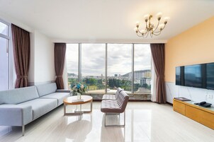 40-inch flat-screen TV with cable channels, TV