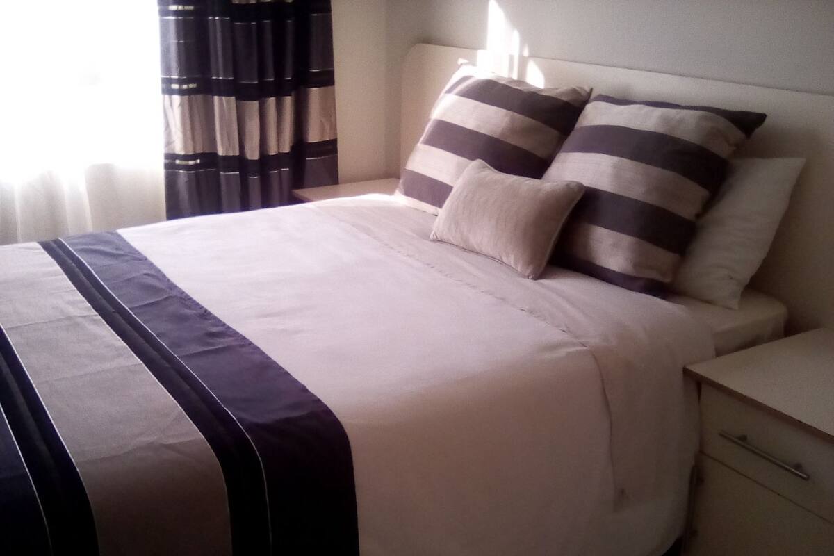 Premium bedding, desk, blackout curtains, soundproofing