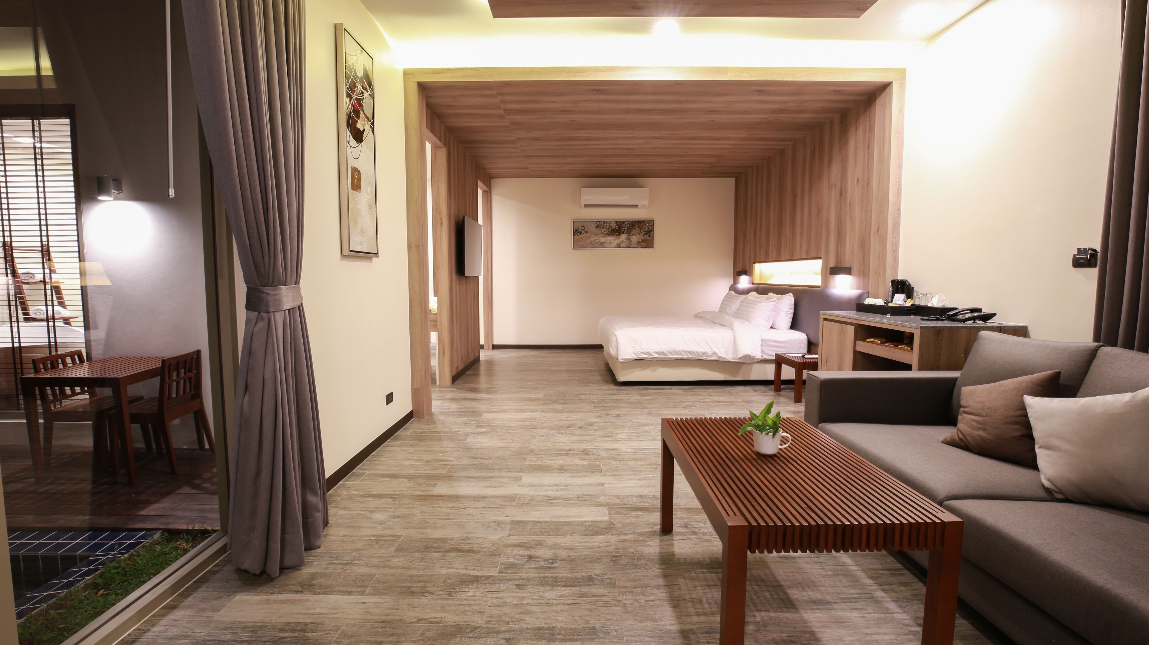 one bedroom pool villa (no kitchen) | living area | flat-screen tv