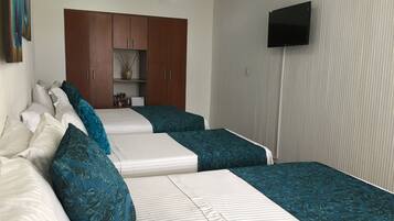 Premium bedding, down comforters, minibar, in-room safe