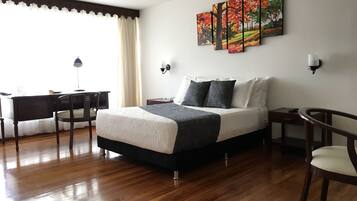 Premium bedding, down comforters, minibar, in-room safe