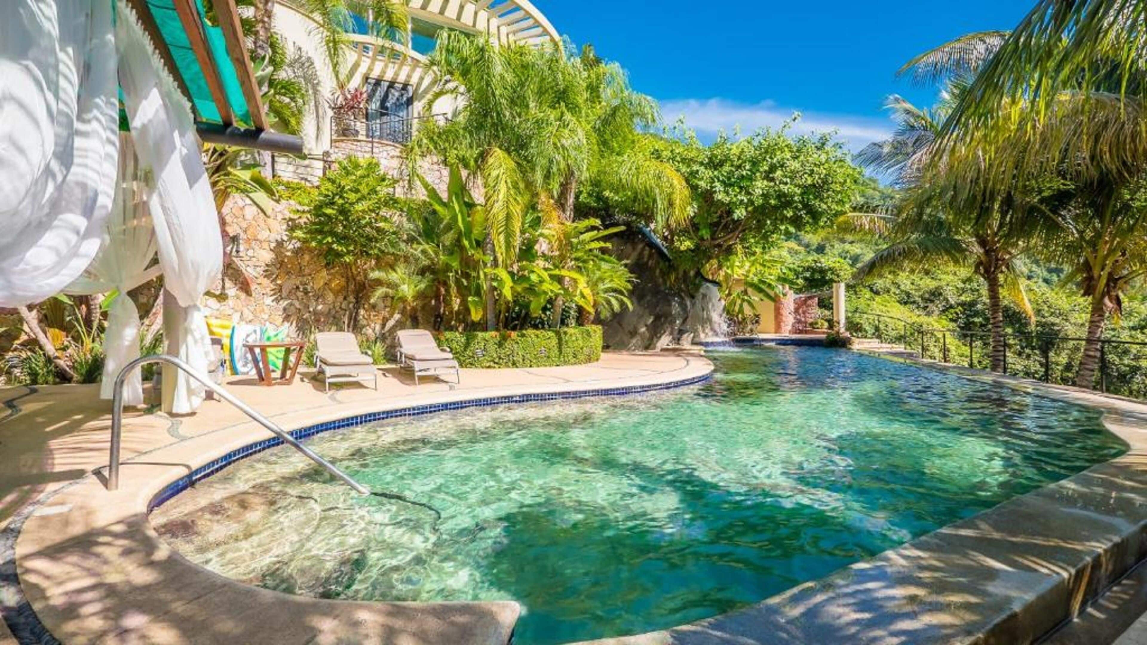 2 outdoor pools, pool umbrellas, pool loungers