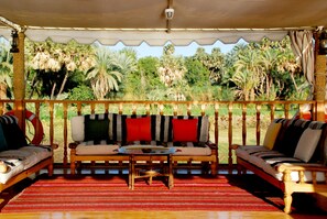 Deluxe Suite, 1 King Bed, Non Smoking, Balcony | Terrace/patio