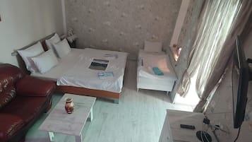 Apartment, 1 King-Bett und Schlafsofa, Nichtraucher | Bettwäsche aus ägyptischer Baumwolle, hochwertige Bettwaren