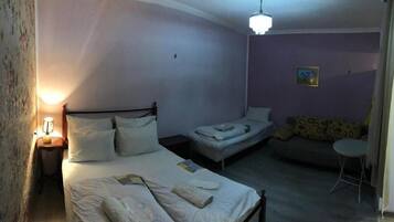 Egyptian cotton sheets, premium bedding, laptop workspace