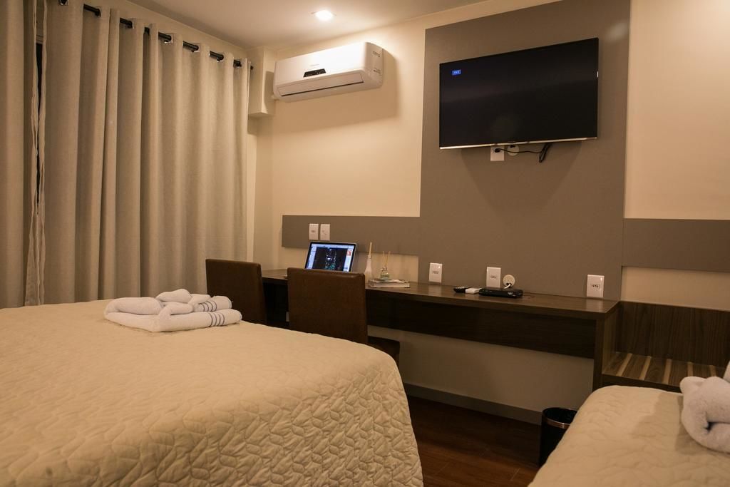 deluxe triple room | 1 bedroom, minibar, in-room safe, desk