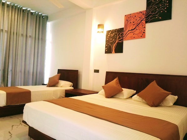 Standard Triple Room  | Blackout curtains, soundproofing, iron/ironing board, free WiFi
