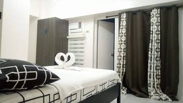 Family Suite, 2 Bedrooms, Lake View | Desk, bed sheets