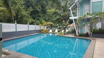 Outdoor pool, open 8:30 AM to 8:00 PM, pool loungers