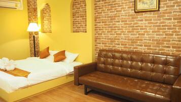 Deluxe Room, 1 King Bed, Non Smoking | Blackout drapes, free WiFi, bed sheets, wheelchair access