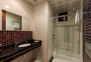 Shower, free toiletries, hair dryer