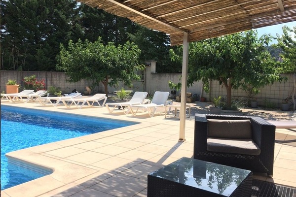 Seasonal outdoor pool, open 9 AM to 9:00 PM, pool umbrellas