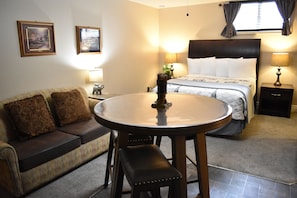 Economy Suite, 1 Bedroom, Non Smoking, Kitchen | Living area | 65-inch LED TV with satellite channels, TV, Netflix