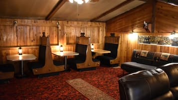 The Lodge | Living area | 65-inch LED TV with satellite channels, TV, Netflix