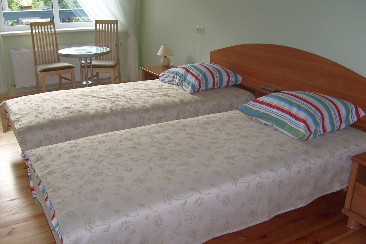 Twin Room | 1 bedroom, minibar, in-room safe, iron/ironing board