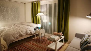 Studio | Down comforters, blackout drapes, soundproofing, iron/ironing board