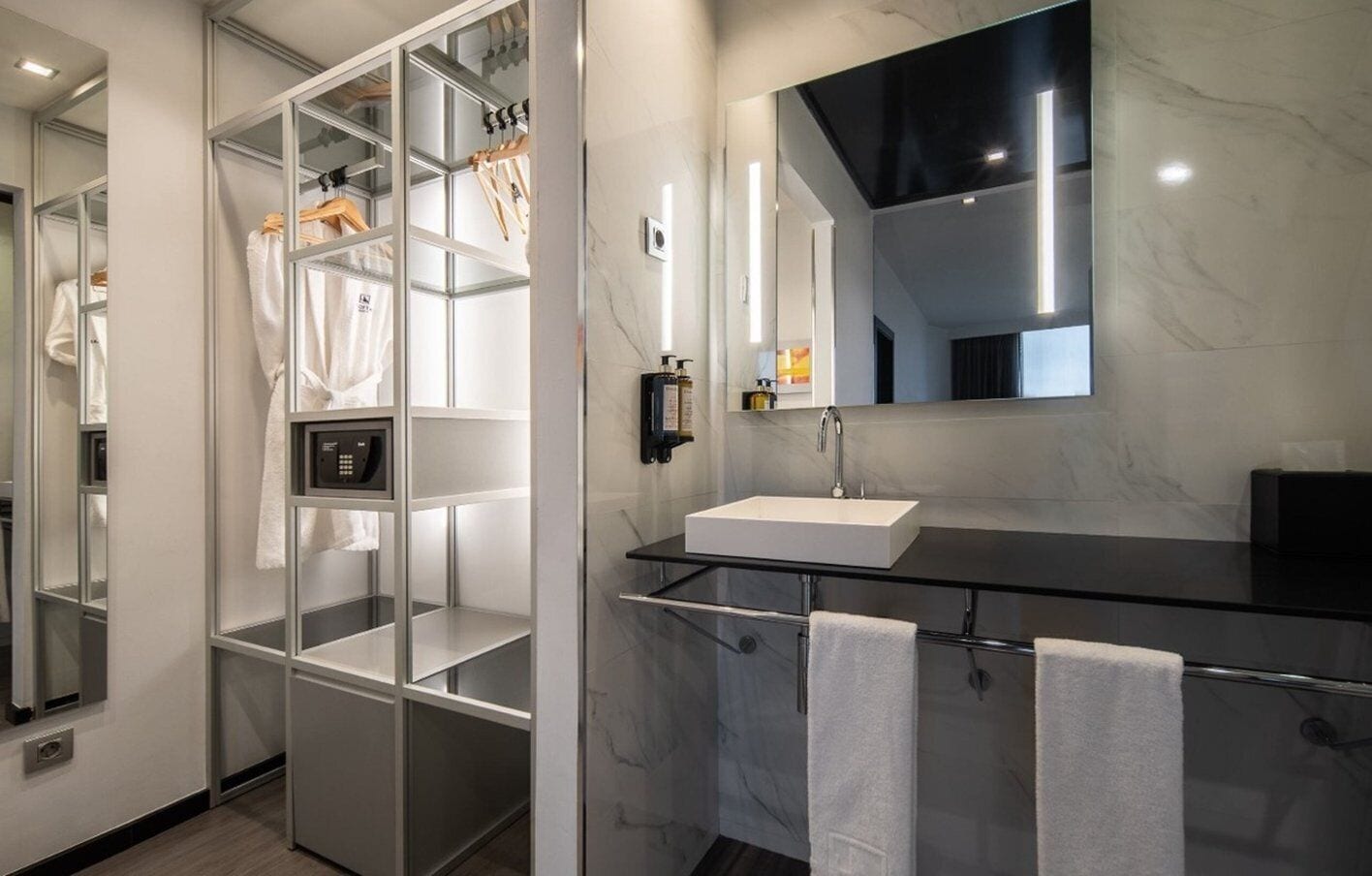 family room | 1 bedroom, minibar, in-room safe, desk