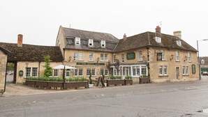 A traditional pub with a sign reading "The King's Arms" and a stone facade. - The Kings Arms Hotel - Inn (Melksham)