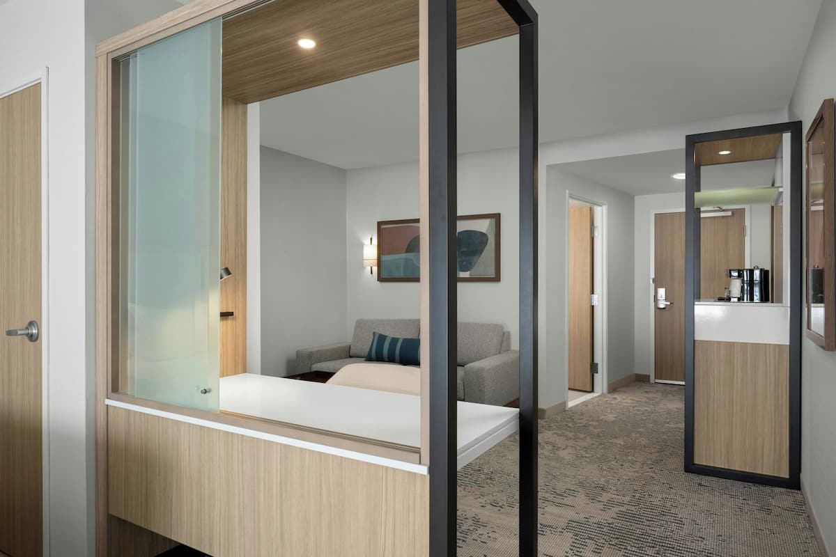 Premium bedding, pillow-top beds, desk, laptop workspace