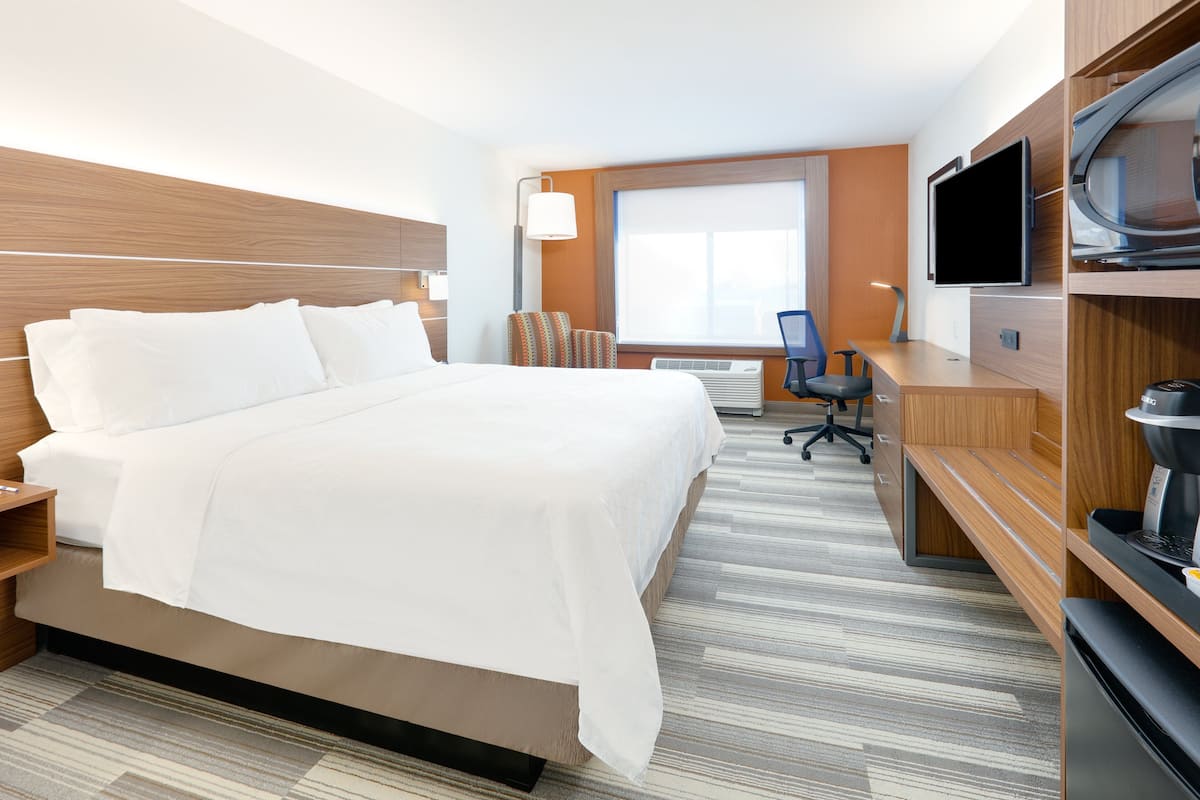 Tempur-Pedic beds, desk, laptop workspace, blackout curtains