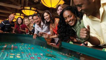 Guests can enjoy a lively game of chance at the casino.
