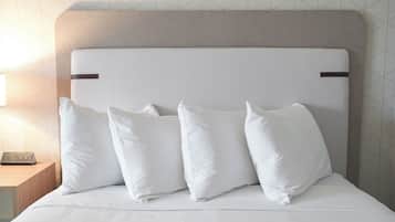 Habitación | Tabla de planchar con plancha, wifi gratis y ropa de cama