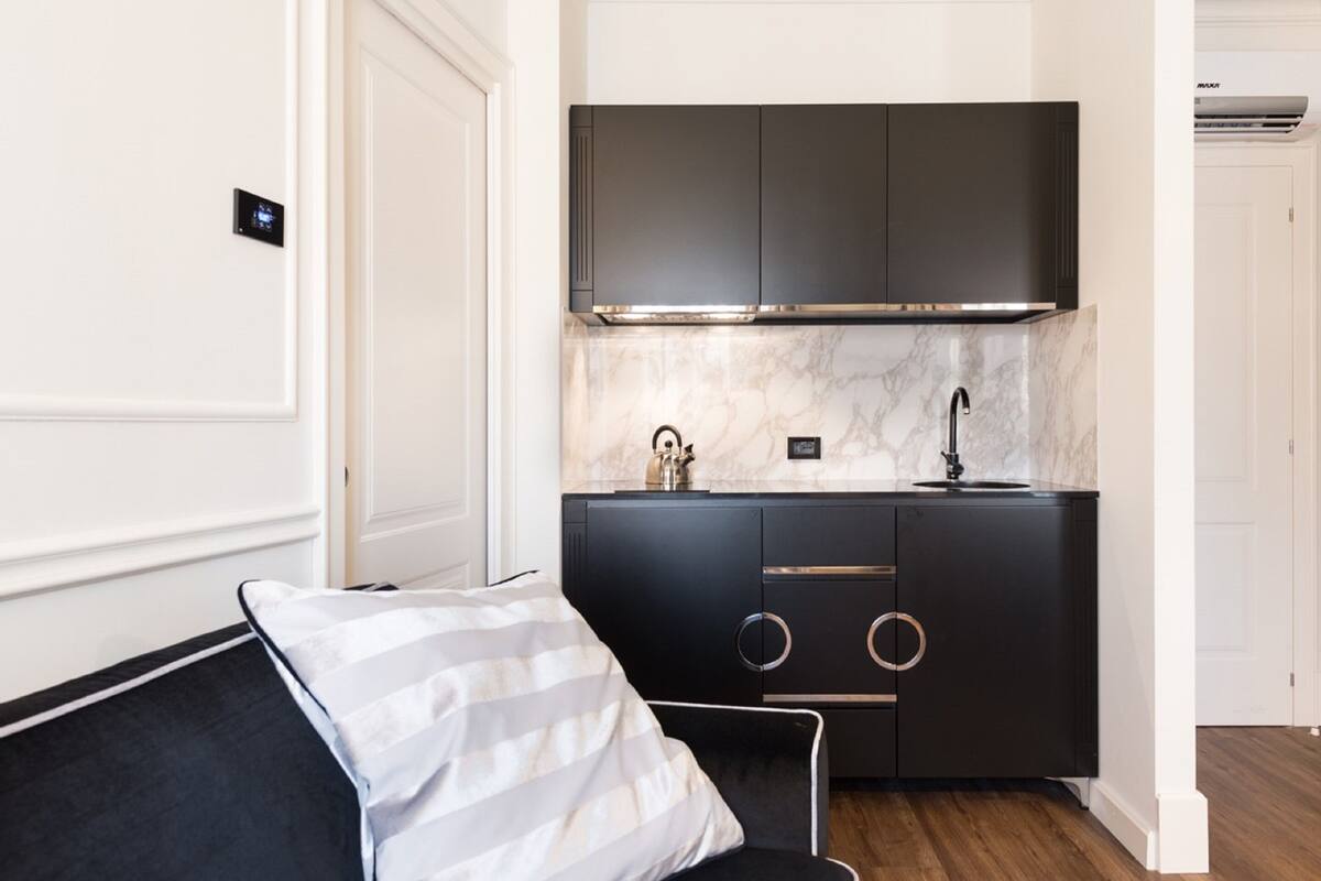 deluxe apartment dependance (4 pax - stradone provolo 3 - separate building, 800 m from hotel)) | living area | 50-inch plasma tv with satellite channels, tv