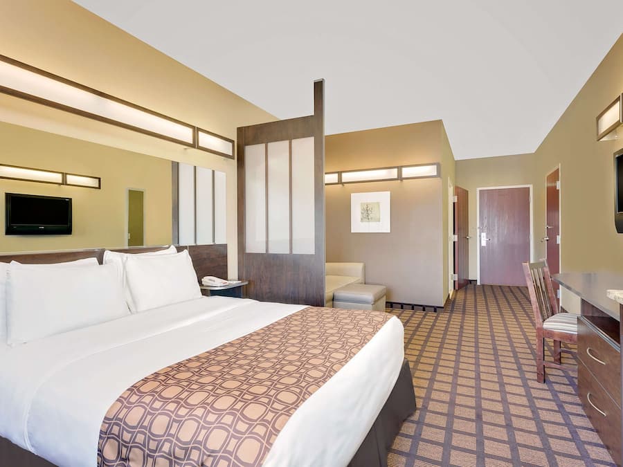 Premium bedding, pillow-top beds, desk, blackout curtains