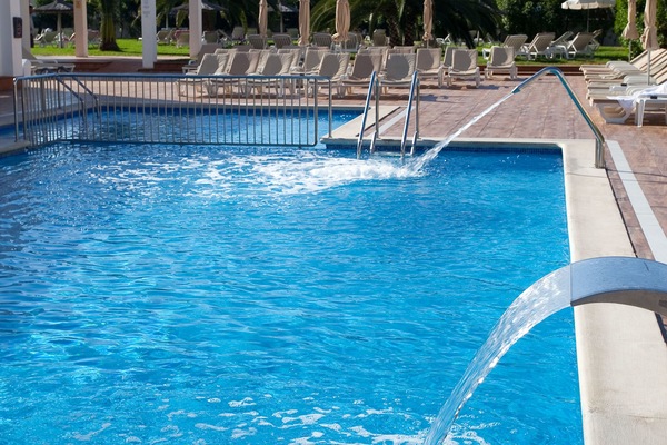 Outdoor pool, pool umbrellas, sun loungers