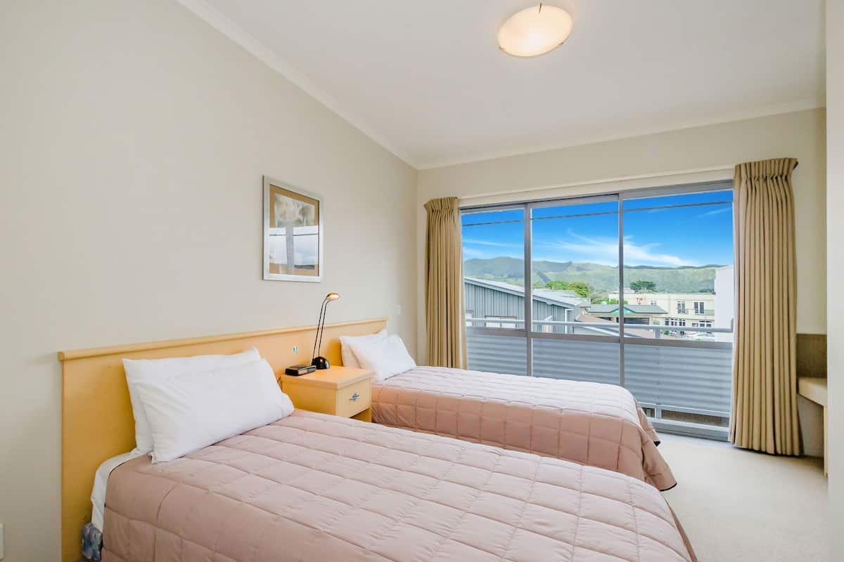 1 bedroom, laptop workspace, blackout drapes, iron/ironing board