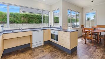 Two Bedroom Accessible Apartment | Private kitchen | Microwave, electric kettle, toaster, cookware/dishes/utensils
