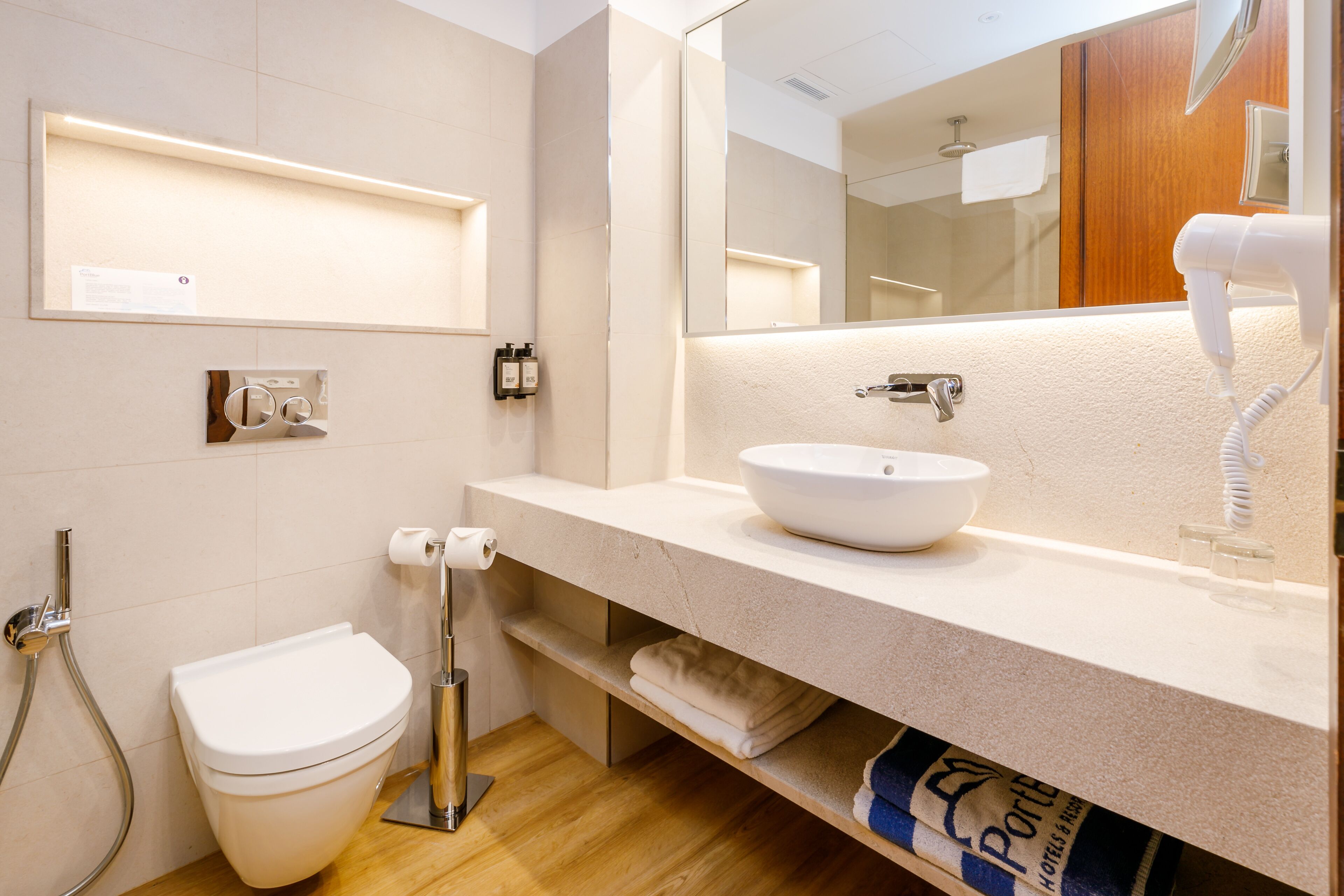 hair dryer, bidet, towels