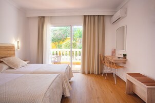 Standard Double Room, Balcony | Down comforters, in-room safe, individually decorated, desk