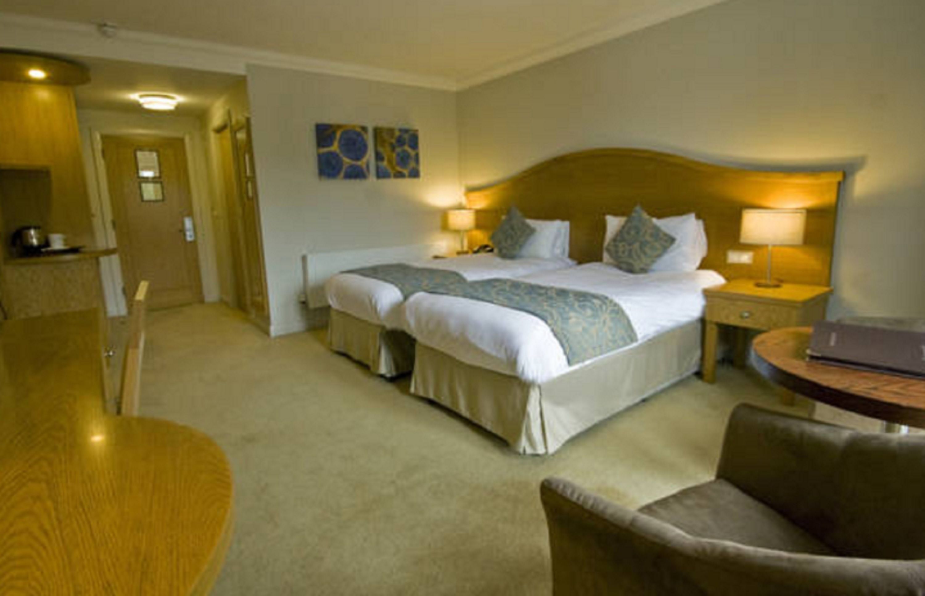 twin room | in-room safe, desk, laptop workspace, blackout curtains