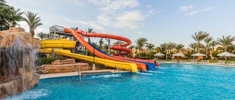 6 outdoor pools, open 8:00 AM to 5:00 PM, pool umbrellas