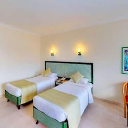 Quarto standard, vista para o jardim | 1 quarto, roupas de cama de algodão egípcio, edredons de pluma