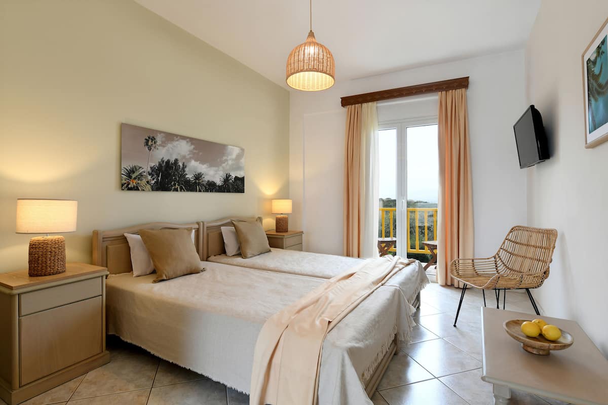 Standard Room, 1 Double or 2 Twin Beds, Sea View | In-room safe, WiFi (free), bed sheets