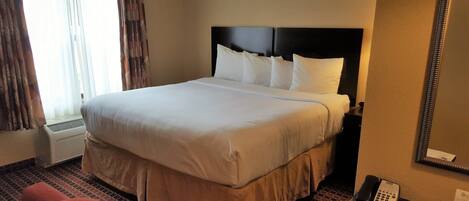 Desk, laptop workspace, blackout drapes, soundproofing