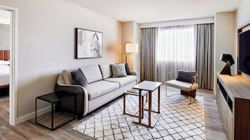 65-inch flat-screen TV with cable channels, TV, pay movies