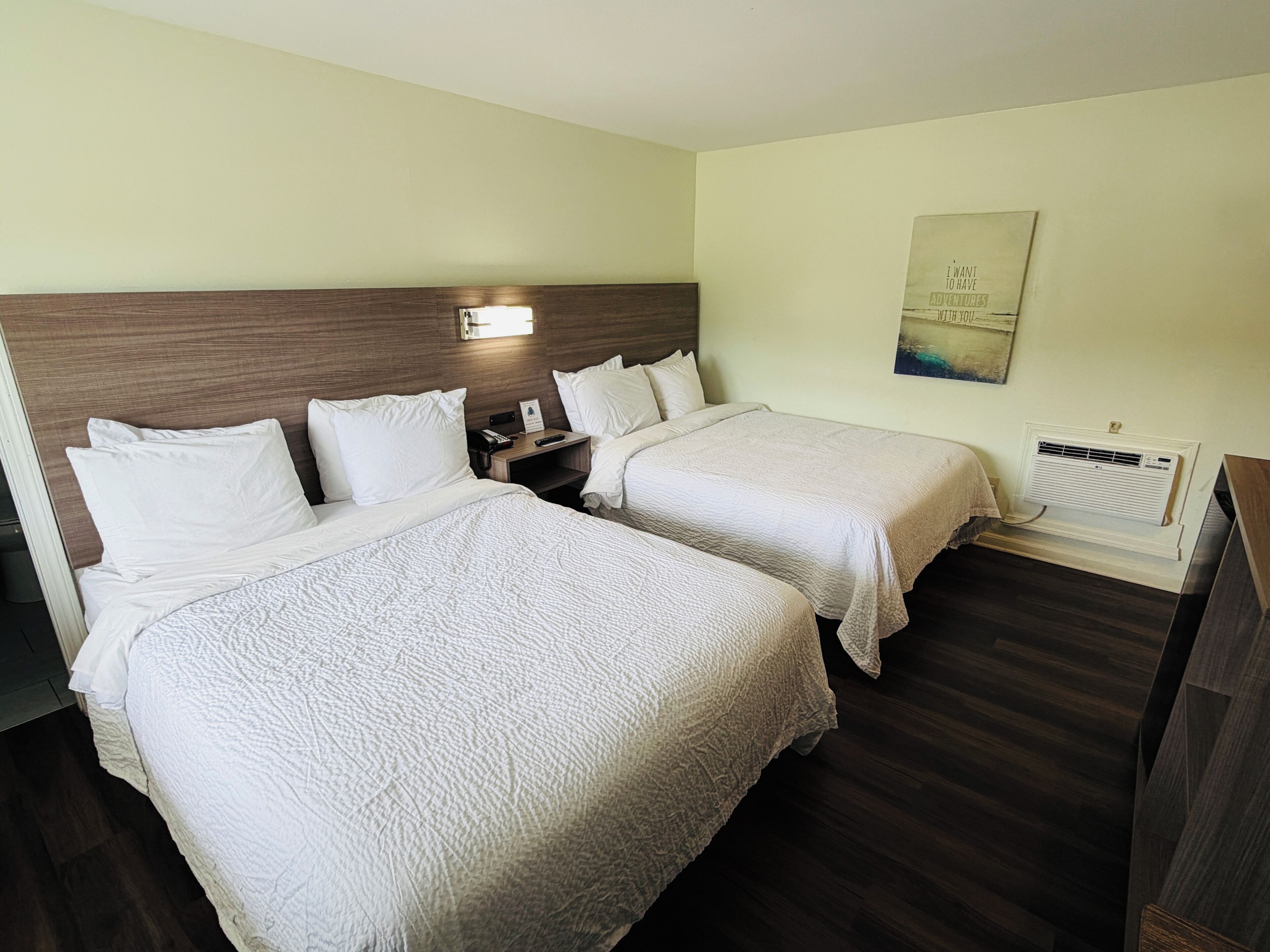 Economy Quadruple Room, 2 Queen Beds | Free WiFi, bed sheets