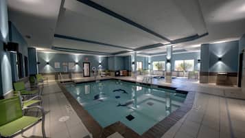 Indoor pool, open 9 AM to 10 PM, pool loungers